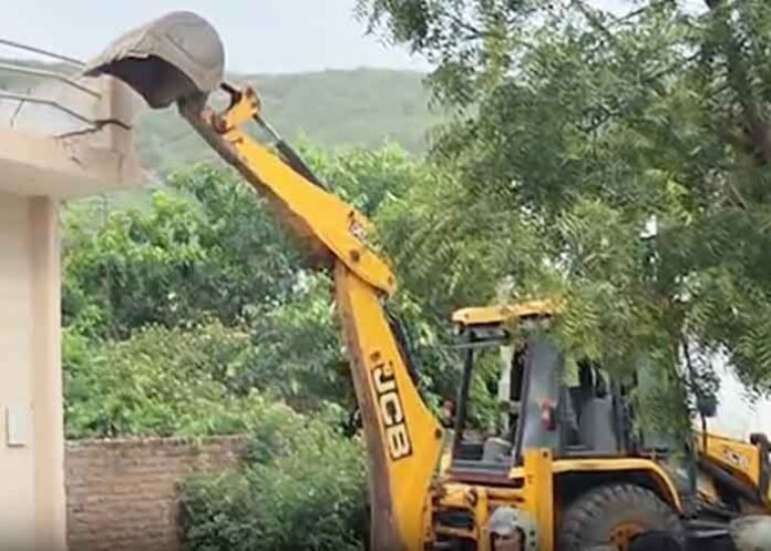 bulldozer demolition illegal orders compensation for shopkeeper