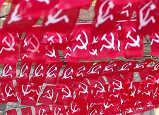 CPI(M) Begins Three-Day Kerala Post-Poll Review, 307 Delegates to Assess Assembly Defeat CPI M Flags Sign
