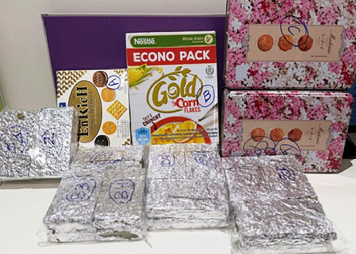 suspected hydroponic marijuana hidden in cookie boxes and a corn flakes packet