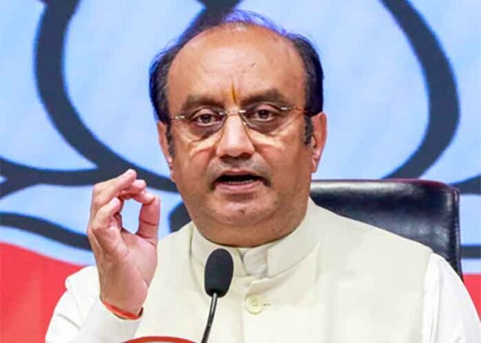 Sudhanshu Trivedi on mic says