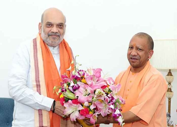 Yogi Adityanath with HM Amit Shah