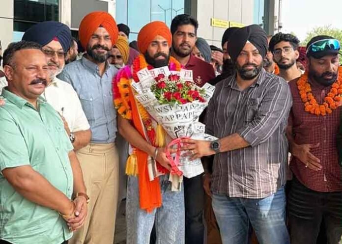 athlete Gurinder Bir Singh receives a warm welcome